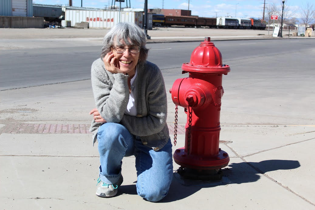 Mary Van Pelt smiling for the camera outside
